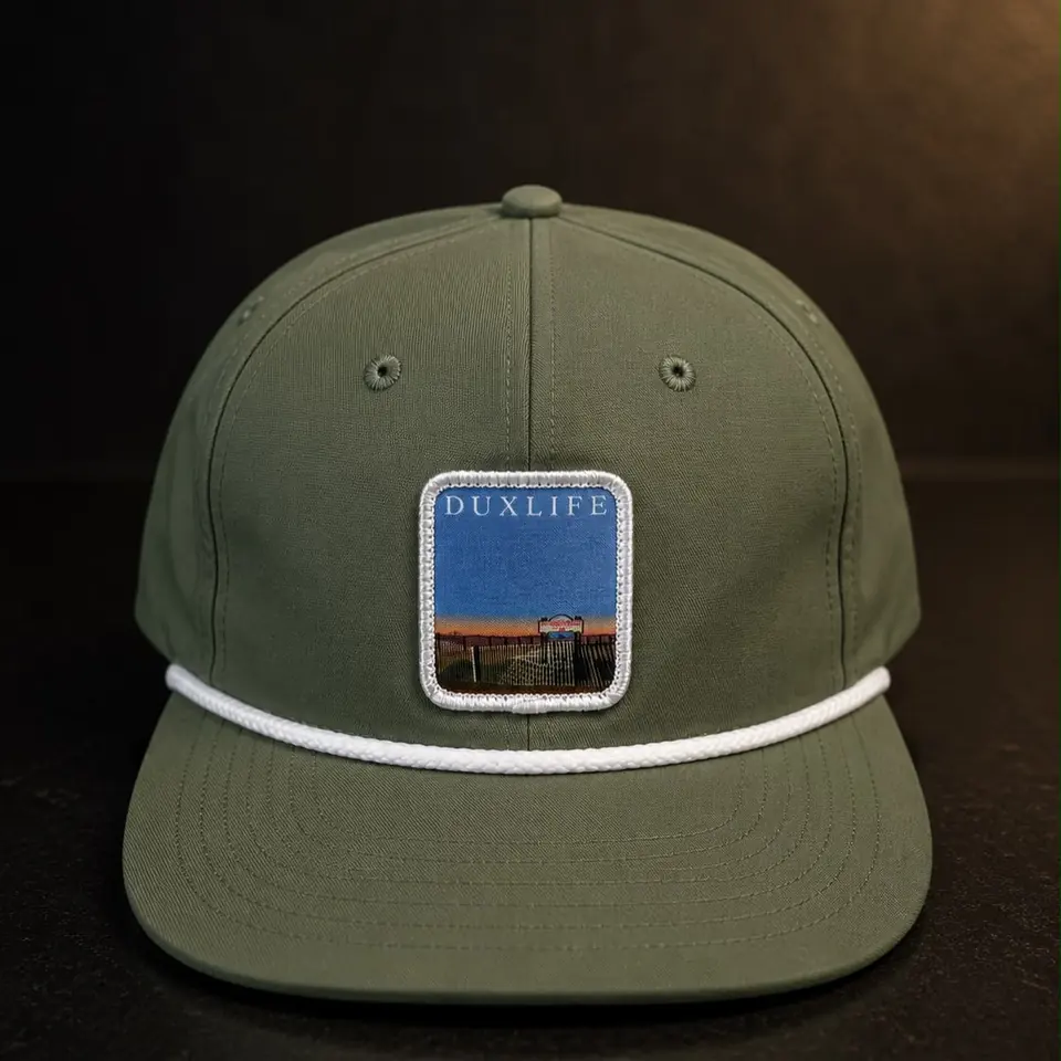 A green Duxlife hat